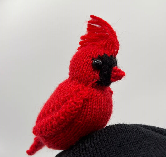 Knitted handmade cardinal bird