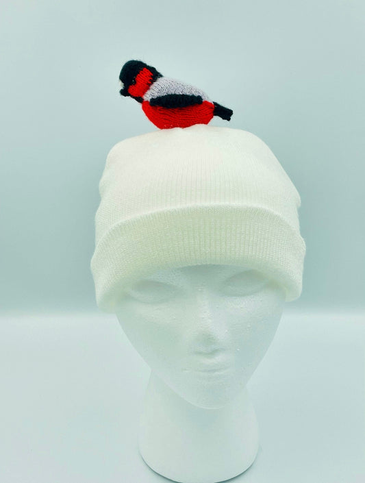 White hat with handmade bird